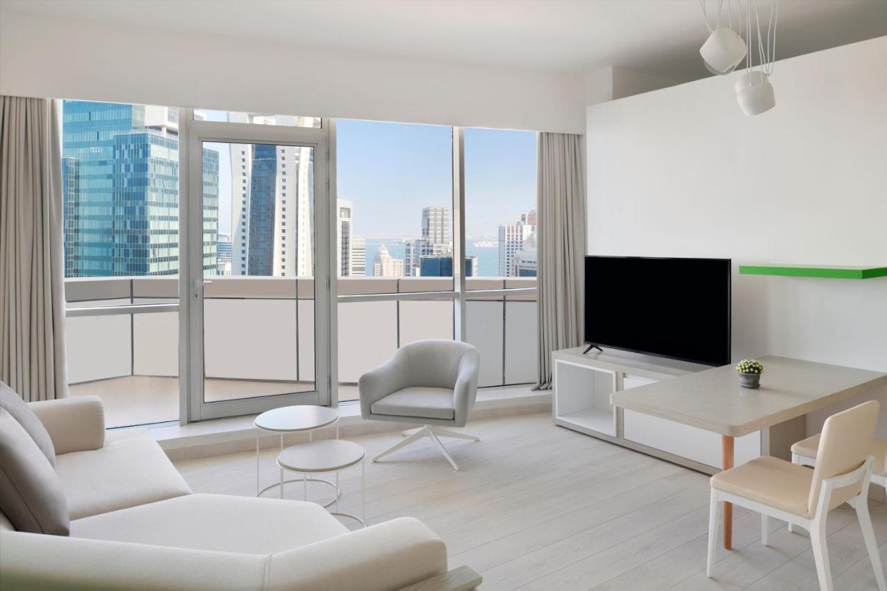 Element By Westin West Bay Doha Hotel Kültér fotó A living room in a condominium