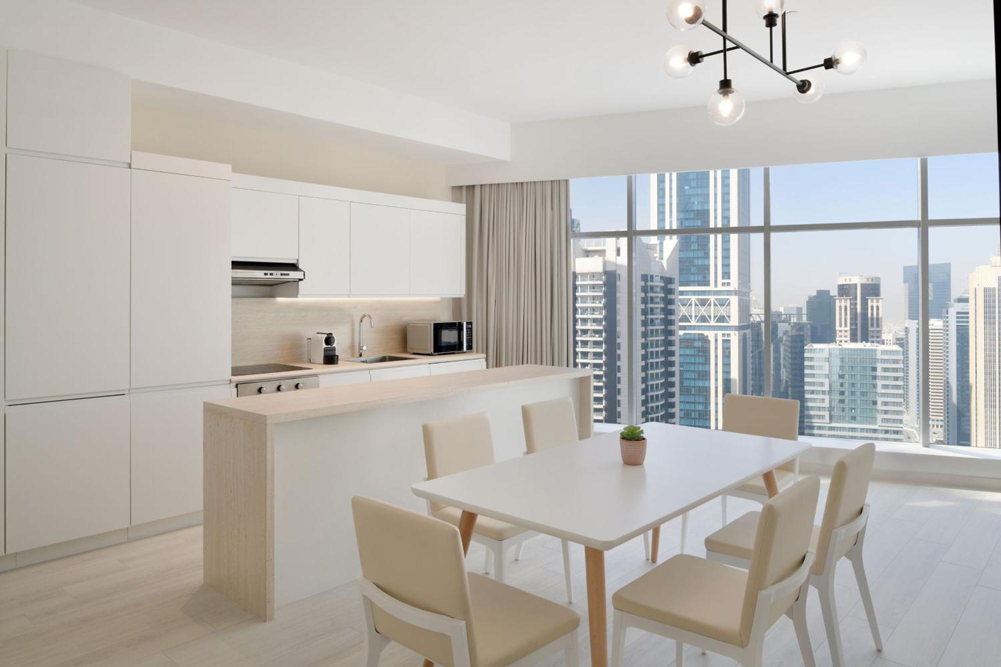 Element By Westin West Bay Doha Hotel Kültér fotó A kitchen in a typical apartment